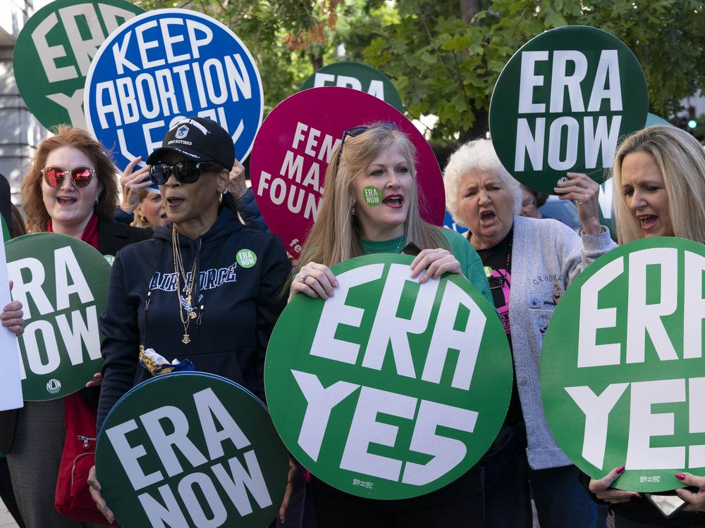 Demonstrators urge ratification of the equal rights amendment during a Sept. 28, 2022 rally in Washington, D.C.