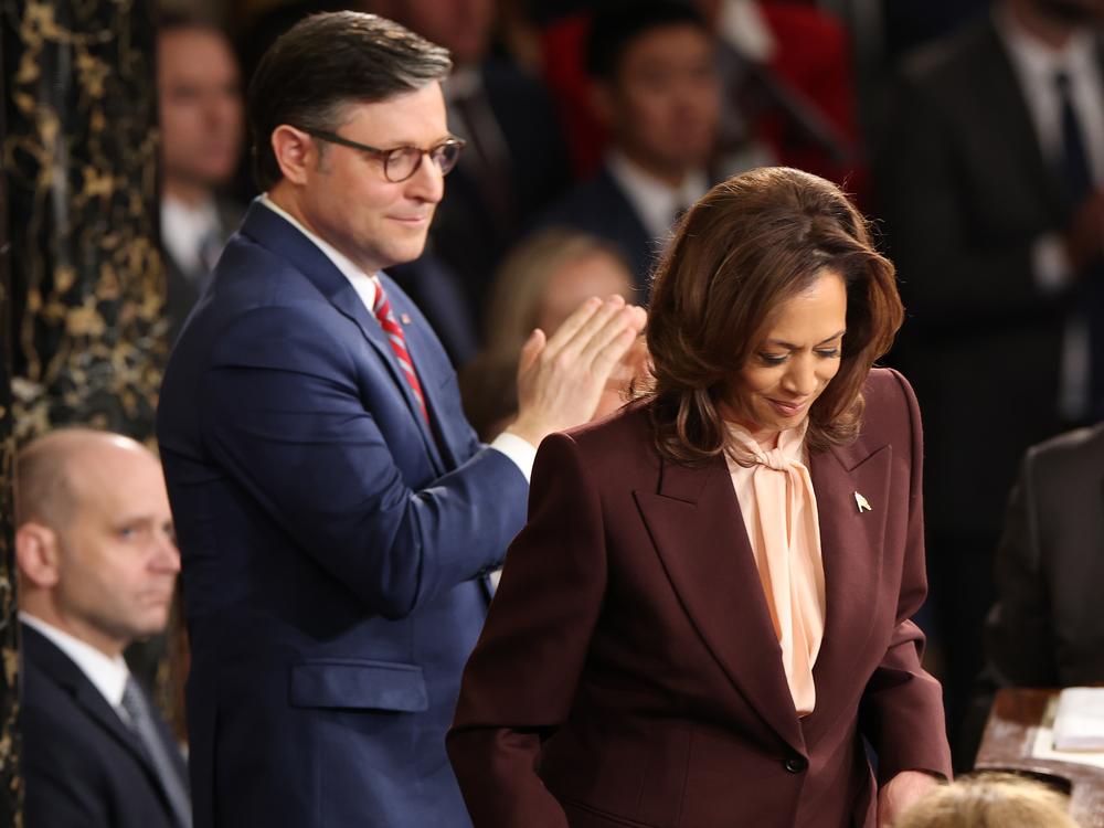 Vice President Harris certifies the Electoral College vote as Speaker Mike Johnson applauds during a joint session of Congress on Jan. 6, 2025, ratifying the 2024 presidential election.