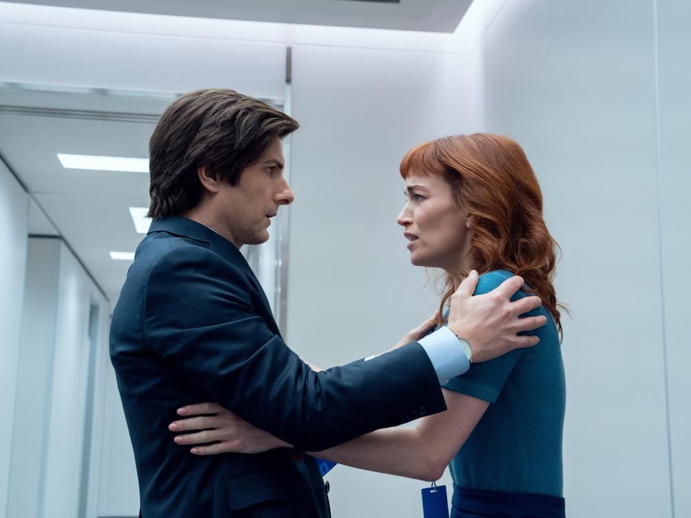The Apple TV+ series <em>Severance</em> returns for a second season on Friday, Jan. 17. Above, Adam Scott as Mark and Britt Lower as Helly.
