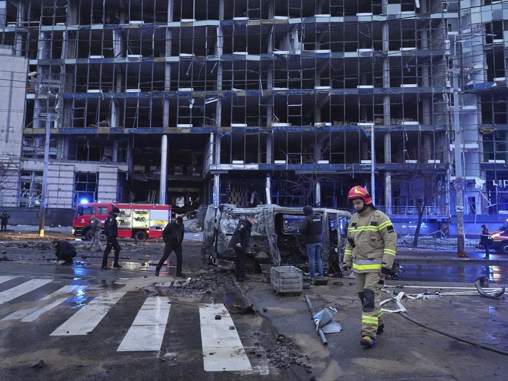 First responders work the scene following a Russian missile attack in Kyiv, Ukraine, on Saturday.
