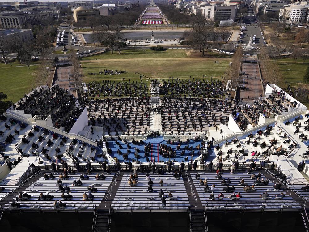 Guests and spectators attend the 59th Presidential Inauguration on the West Front of the U.S. Capitol on Jan. 20, 2021, in Washington, D.C.