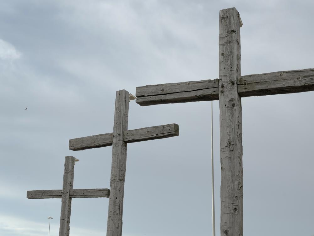 Crosses stand in front of a church in North Platte, Neb.