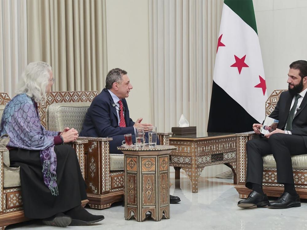 Syria's de facto leader Ahmad al-Sharaa, right, meets with Debra Tice, the mother of American journalist Austin Tice, who went missing in Syria in 2012, left, and Nizar Zakka, head of non-profit Hostage Aid Worldwide, center, in Damascus, Syria, Monday, Jan. 20, 2025.