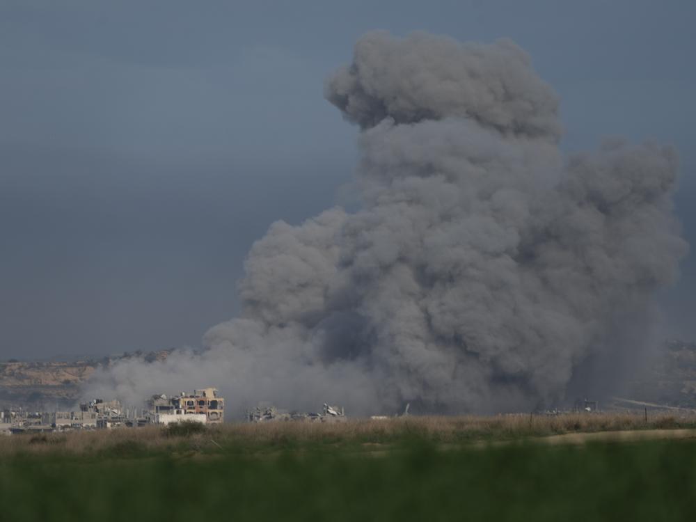 Smoke rises after an explosion in northern Gaza, before a ceasefire deal between Israel and Hamas goes into effect, as seen from Israel, Jan. 19, 2025.