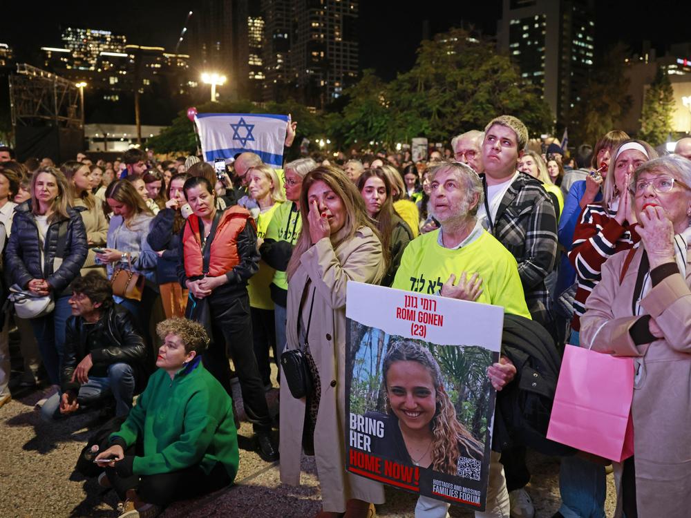 Supporters and relatives of hostages held captive in the Gaza Strip since the Oct. 7, 2023 attacks by Palestinian militants, react while watching a live television broadcast on the release of Israeli hostages, at the Hostages Square in Tel Aviv, on Jan. 19, 2025.