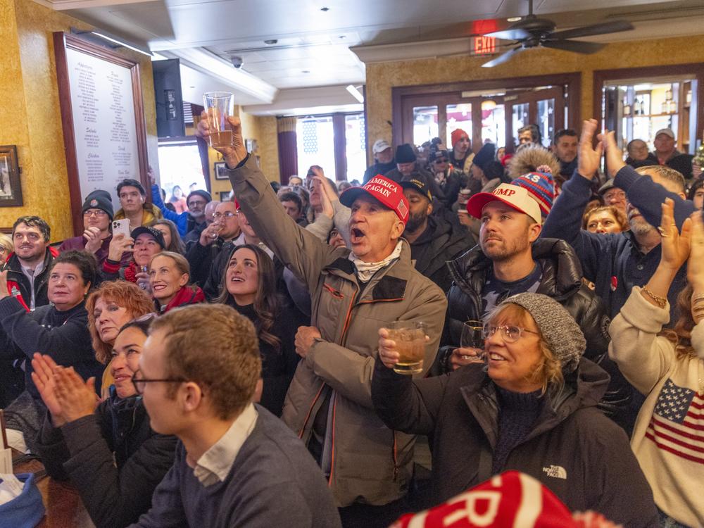 Trump supporters watching the inauguration at Carmine's Restaurant in downtown Washington, D.C.