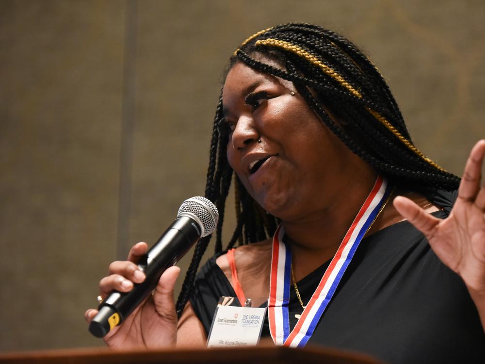 Keona Beamon is two semesters from finishing her business administration degree at Richmond's Reynolds Community College. Here she speaks at a statewide Great Expectations event held in August.<br>