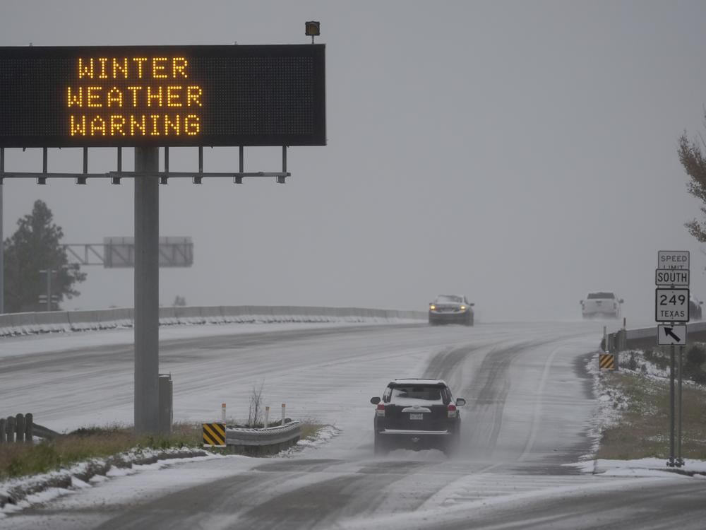 Houston, Texas: Cars travel on a snow covered highway Tuesday, Jan. 21.