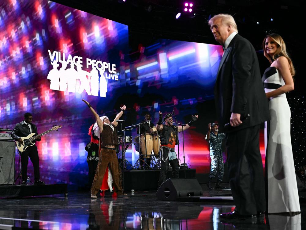President Trump and First Lady Melania Trump watch as the Village People perform during the Liberty inaugural ball at the Walter E. Washington Convention Center on Monday.