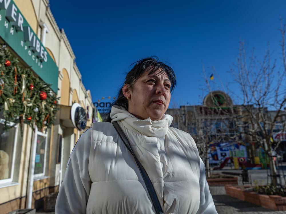 Svitlana Budiukh, age 43, volunteers in Kherson delivering food and other aid to people trapped in their homes by the fighting. She has experienced Russian drone attacks while making deliveries in her civilian vehicle. She says the danger is worse in winter, when the trees are bare and there are fewer places to hide.