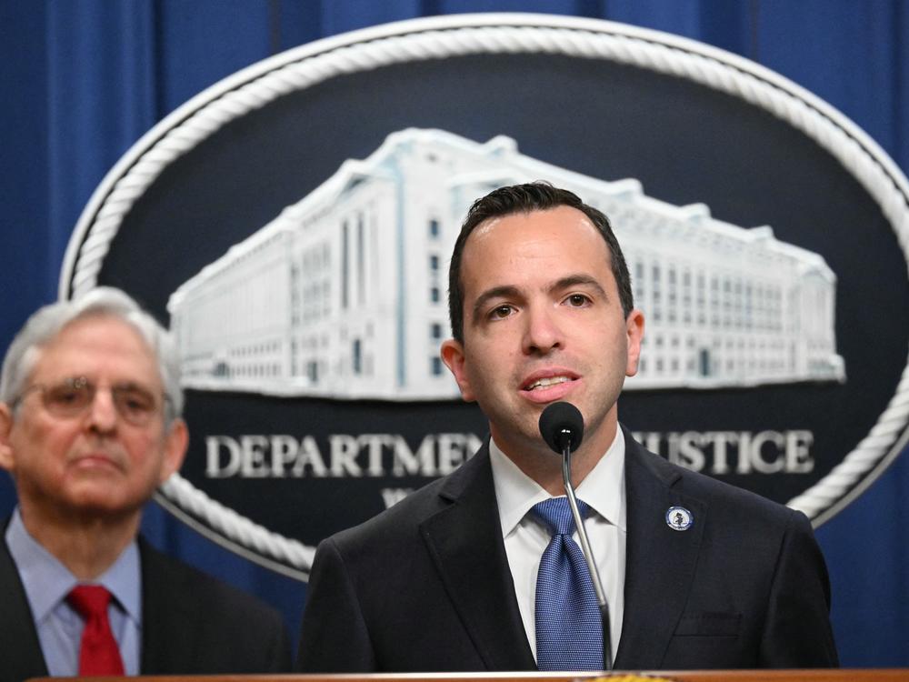 New Jersey Attorney General Matthew Platkin (center) speaks during a press conference at the Justice Department in Washington, DC, on March 21, 2024.