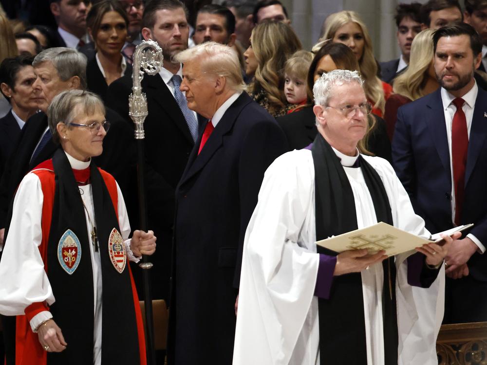 Bishop Mariann Edgar Budde arrives as President Donald Trump and Vice President J.D. Vance look on during the Service of Prayer for the Nation Prayer Service at Washington National Cathedral on Tuesday.