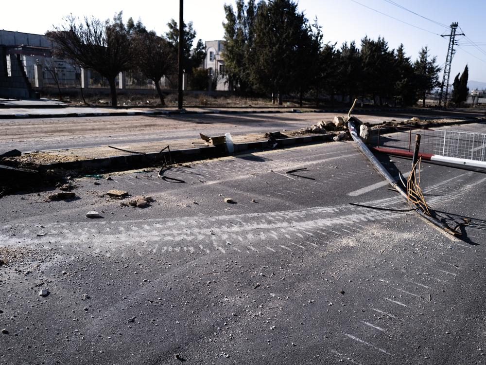 Tracks from an Israeli tank are left on a road in Syria following an Israeli incursion.