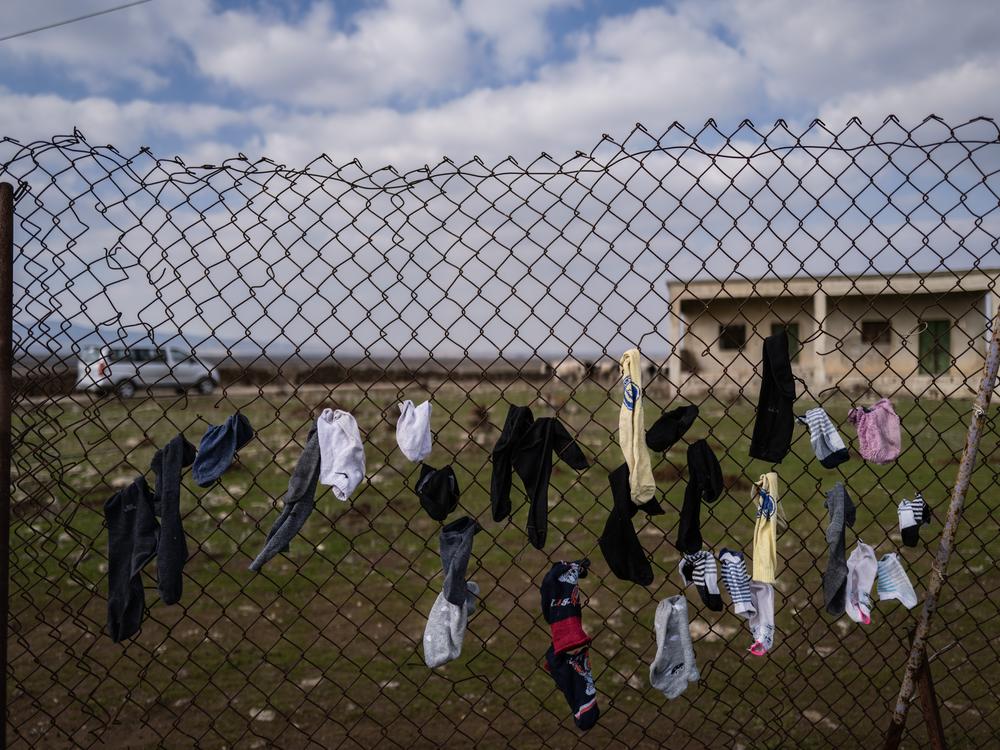 Laundry drying on a fence along the border between Syria and the Israeli-occupied Golan Heights.