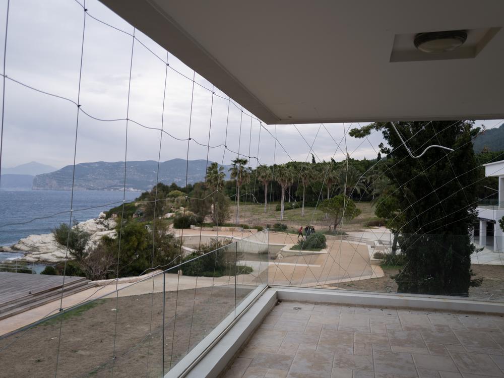 The sprawling, empty villa overlooks the Mediterranean.
