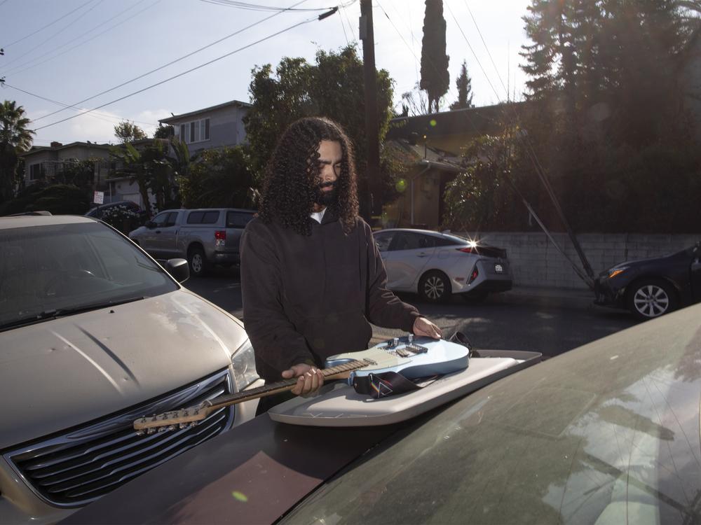 Escaping the devastating fire, Swinnie had just enough time to grab a few of his favorite possessions. As a musician, he prioritized his guitar and speakers.