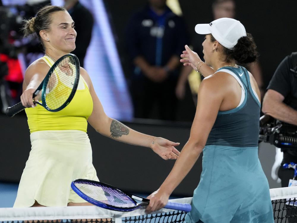 Madison Keys, right, of the U.S. is congratulated by Aryna Sabalenka, left, of Belarus following the women's singles final at the Australian Open tennis championship in Melbourne, Australia, Saturday, Jan. 25, 2025.