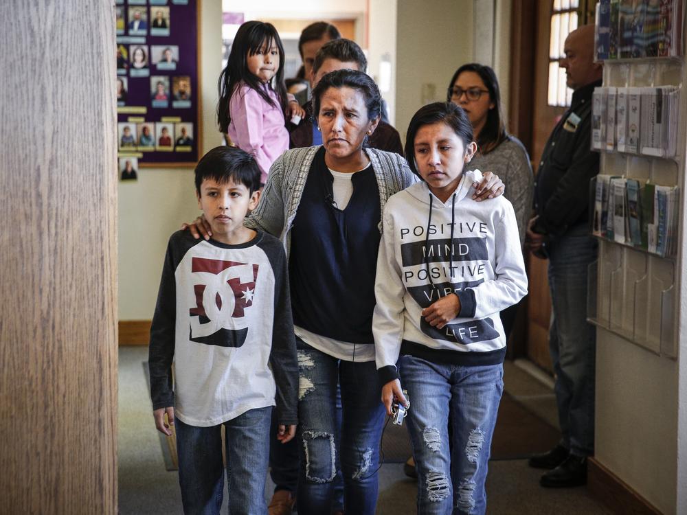 2017: Jeanette Vizguerra, who came to the U.S. without immigration documents, walks with two of her children as they seek sanctuary at First Unitarian Church in Denver, Colo. Vizguerra, who had been working in the U.S. for some 20 years, moved into a room in the basement of the church as she faced immediate deportation. Today, she continues working as an activist in the U.S.