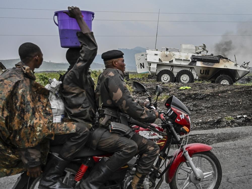 A UN armoured personnel carrier burns during clashes with M23 rebels outside Goma, Democratic Republic of the Congo, Saturday, Jan. 25, 2025.