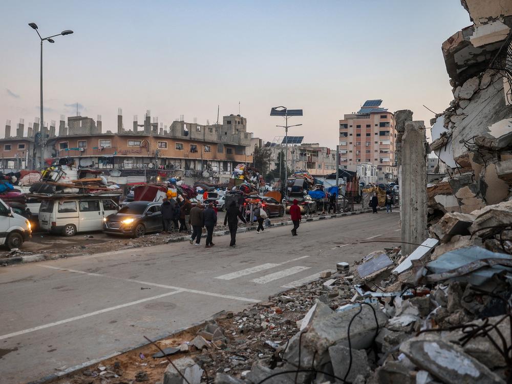 Vehicles queue up along the Salah al-Din road in Nuseirat near the Netzarim corridor while waiting to cross to the northern part of the Gaza Strip on Jan. 27, 2025.