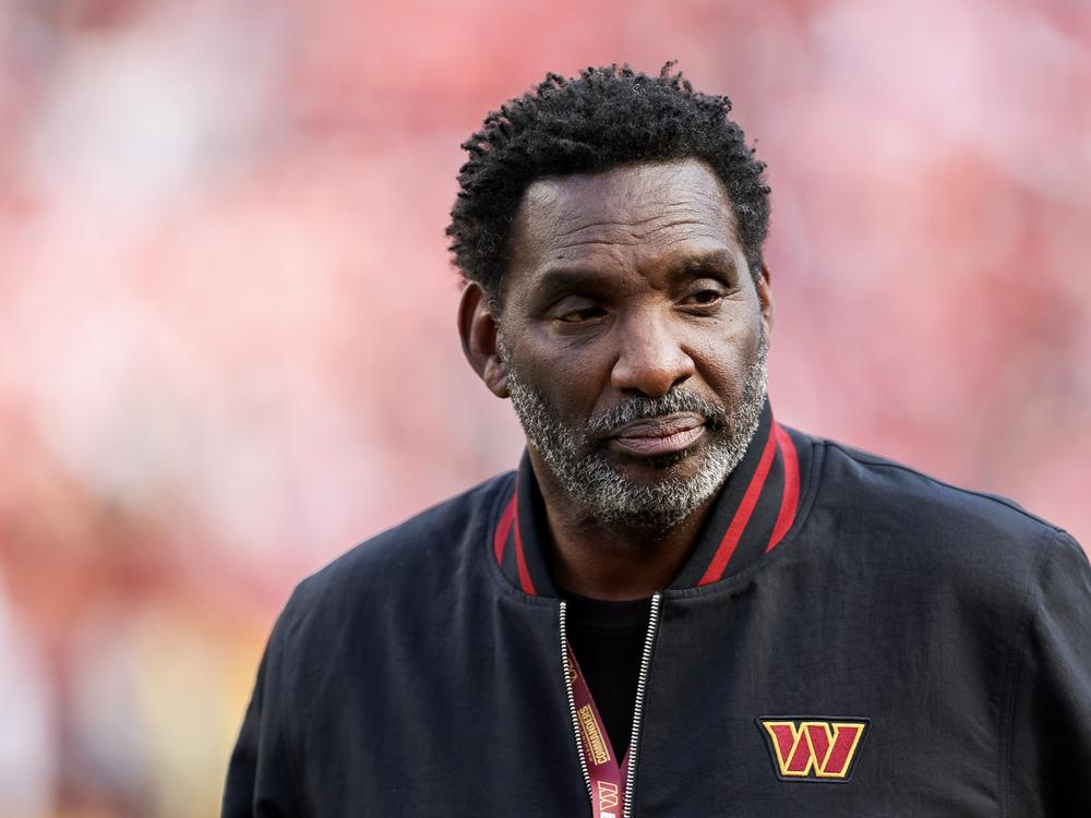 Former Washington Commanders quarterback and current senior adviser to the team Doug Williams looks on before to a game against the San Francisco 49ers in December in Landover, Md.