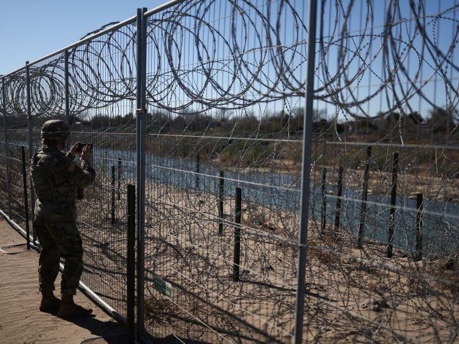 A U.S. Army soldier monitors the border with Mexico in Eagle Pass, Texas, last week. President Trump ordered 1,500 more active military personnel to the southern border, part of a broad immigration crackdown during his first week in office.