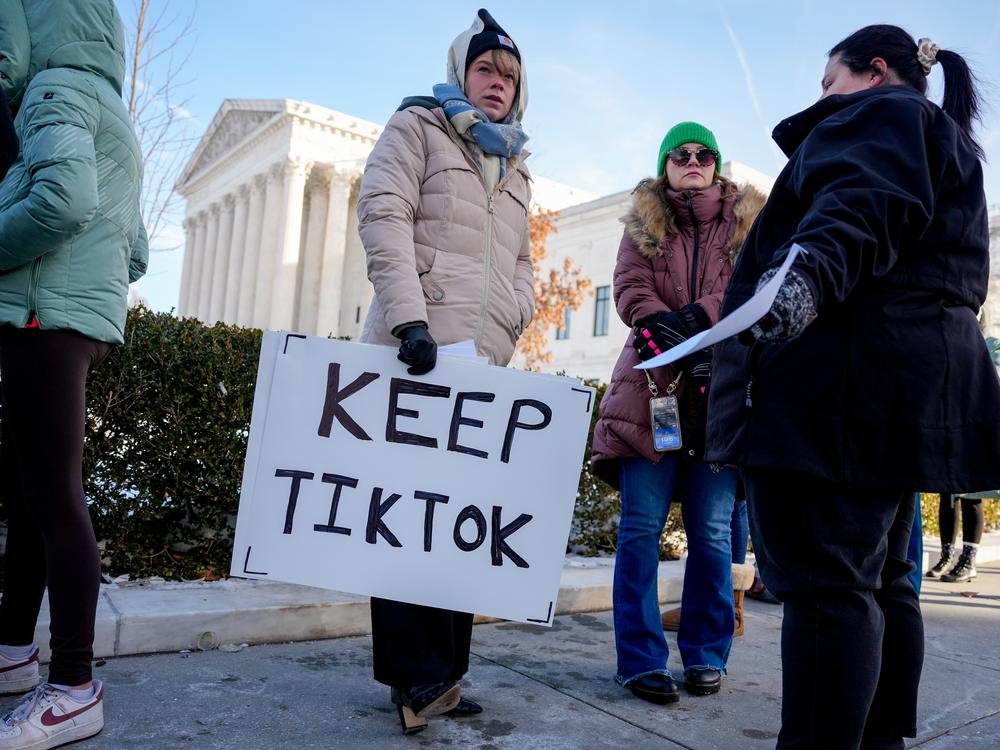 People who support keeping TikTok stand outside the Supreme Court Building in Washington, D.C. on Jan. 10, 2025.