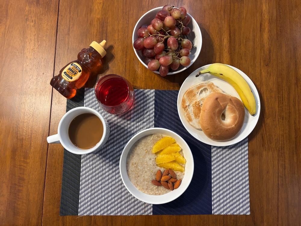 This breakfast, which includes a bagel, a banana, grapes, oatmeal, coffee, honey and cranberry juice, would have cost more a year ago.