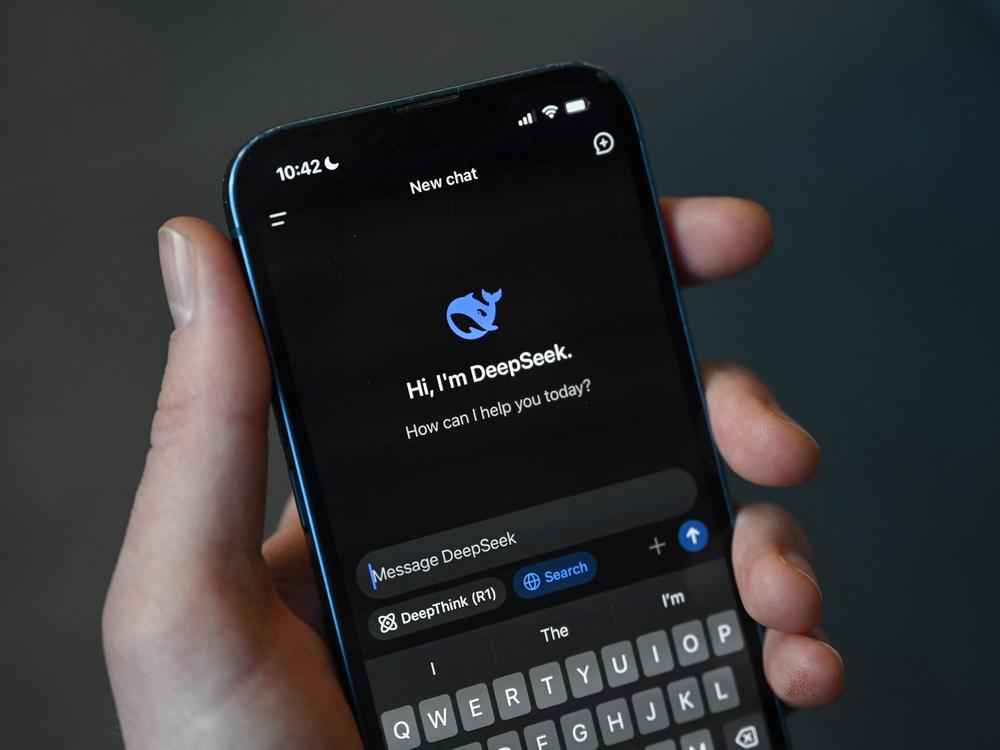This photo illustration shows the DeepSeek app on a mobile phone in Beijing on Jan. 27. Chinese firm DeepSeek's artificial intelligence chatbot has soared to the top of the Apple Store's download charts.