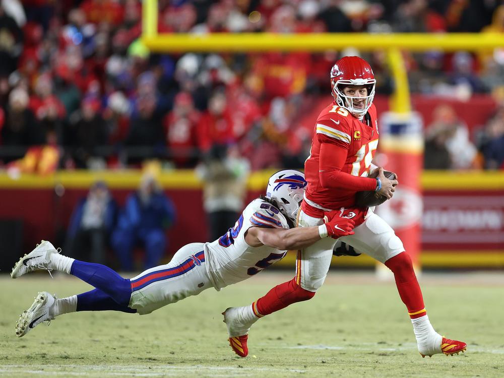 Patrick Mahomes of the Kansas City Chiefs is sacked by Matt Milano of the Buffalo Bills during the third quarter in the AFC Championship Game at GEHA Field at Arrowhead Stadium on Jan. 26 in Kansas City, Missouri.