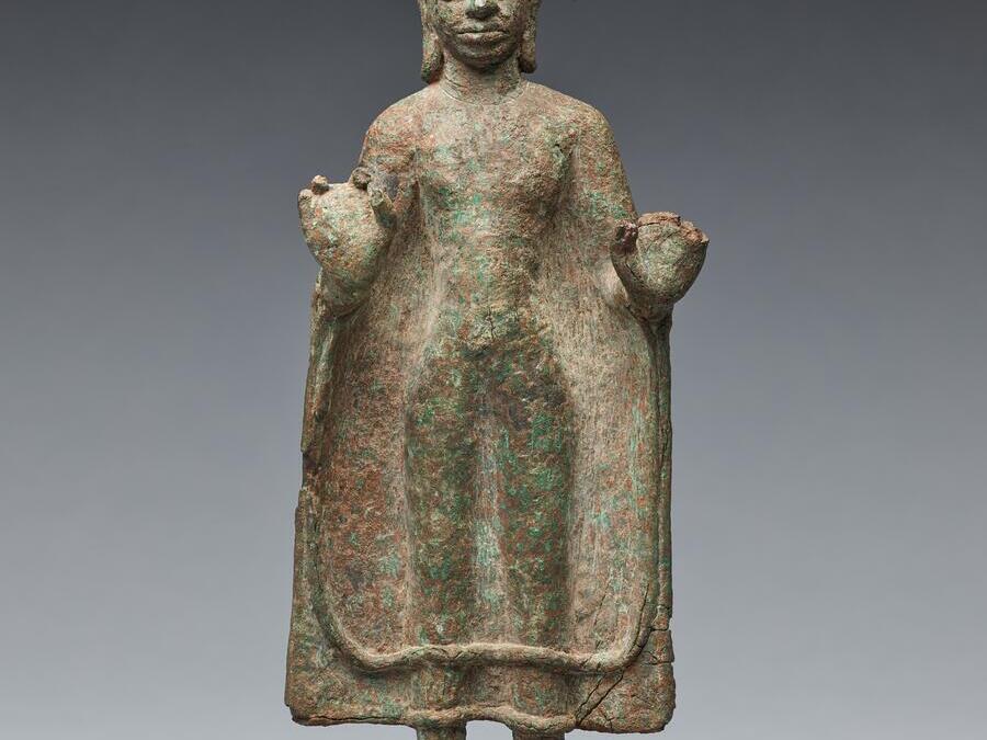 One of the statues on display in the <em>Moving Objects</em> exhibition: Standing Buddha, 750-850 CE, Thailand, likely from Prasat Hin Khao Plai Bat II, Buriram Province, Bronze.