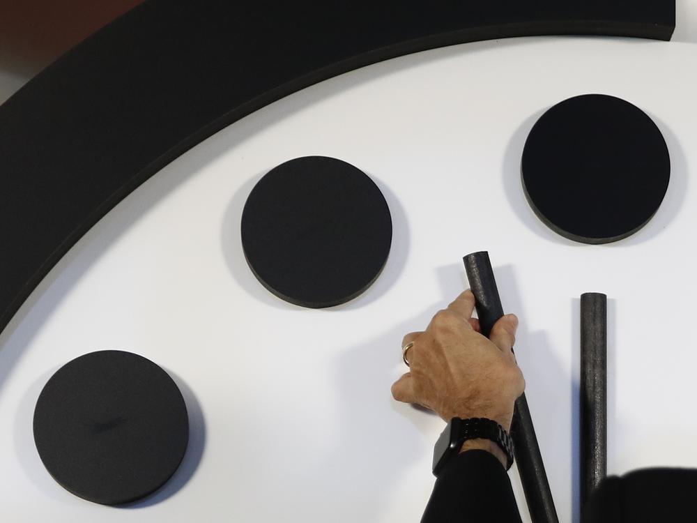 Robert Rosner, chairman of the Bulletin of the Atomic Scientists, moves the minute hand of the Doomsday Clock to two minutes to midnight in January 2018.