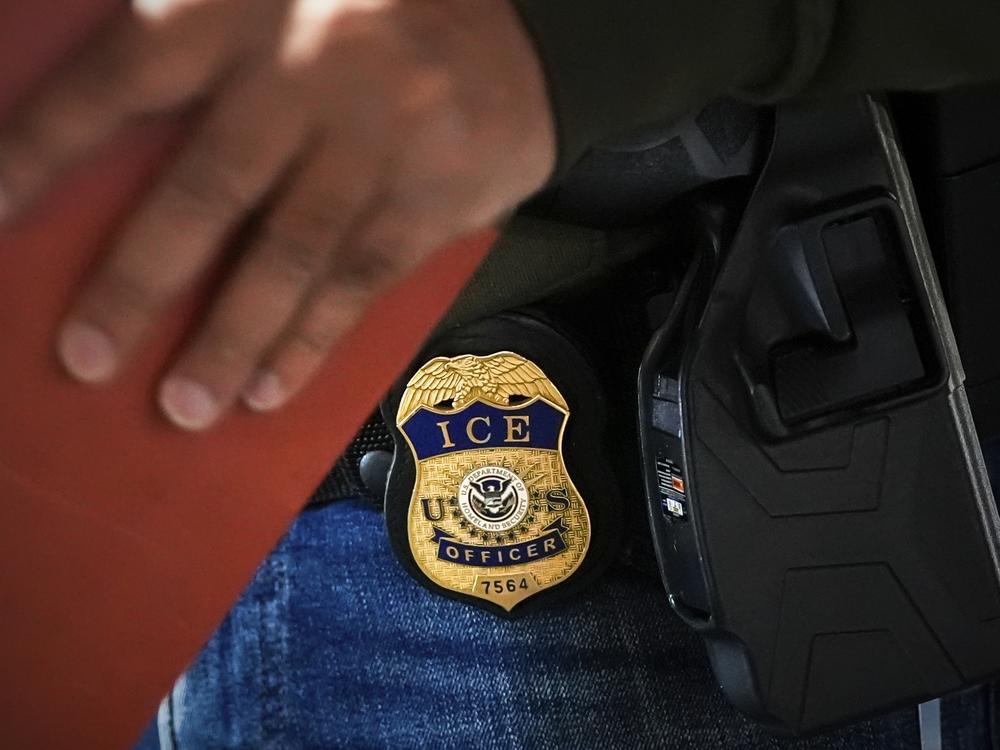 A deportation officer with Enforcement and Removal Operations in U.S. Immigration and Customs Enforcement's New York City field office conducts a brief before an early morning operation on Dec. 17, 2024, in the Bronx borough of New York.