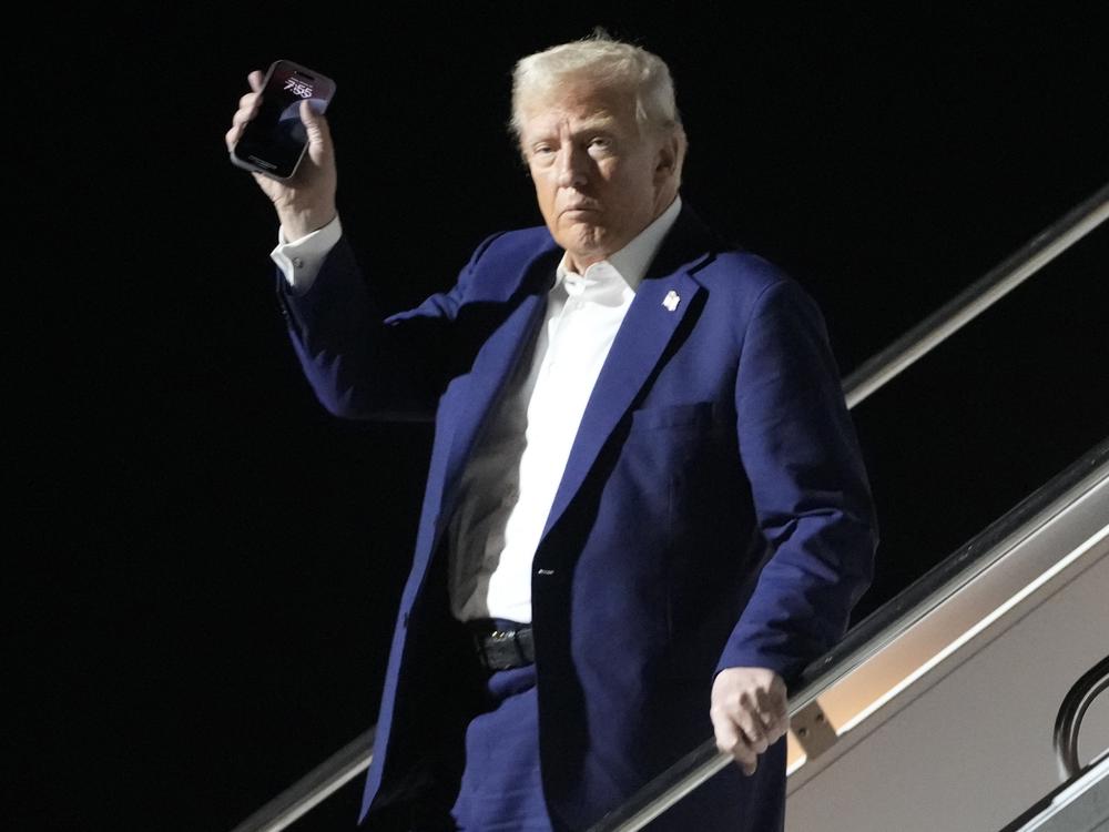 President Donald Trump arrives on Air Force One at Harry Reid International Airport in Las Vegas, Friday, Jan. 24, 2025.