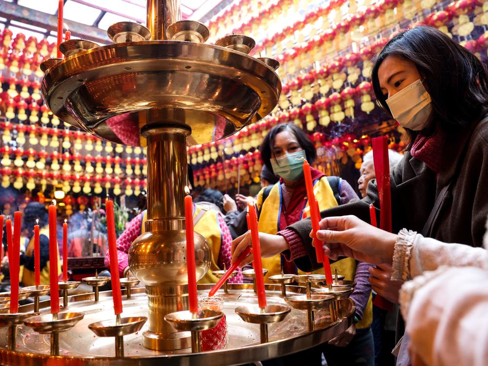 Keelung, Taiwan: People light candles on the first day of the Lunar New Year of the Snake at a temple in Keelung on Jan. 29.