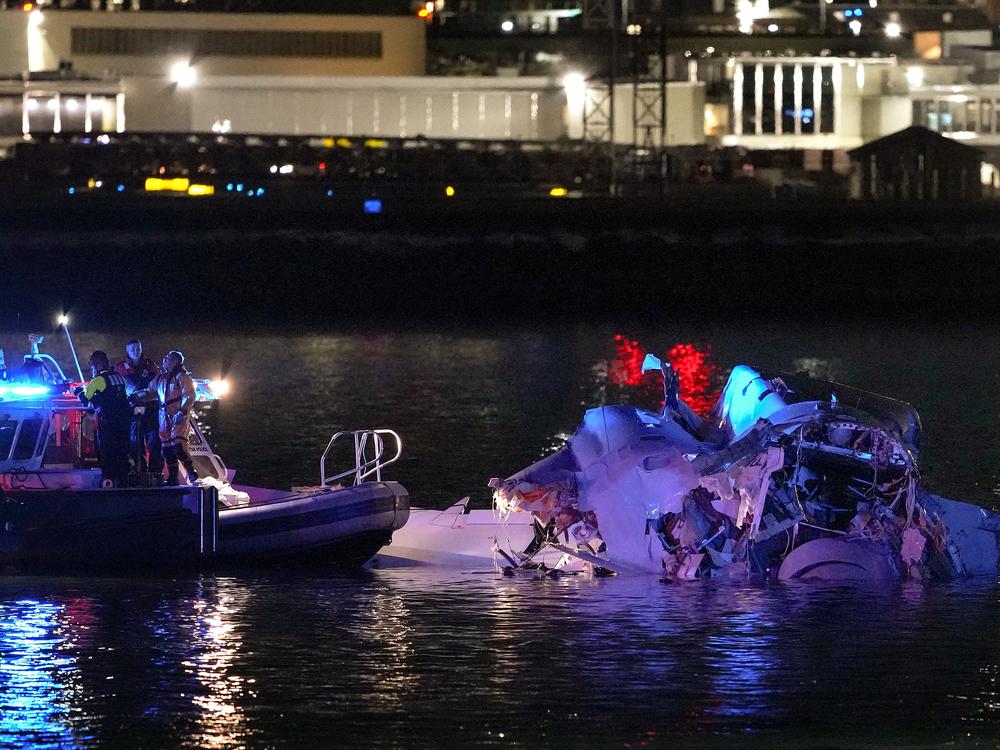 Emergency units respond in the Potomac River after a passenger aircraft collided with a helicopter near Ronald Reagan Washington Airport on Jan. 30, 2025, in Arlington, Va.