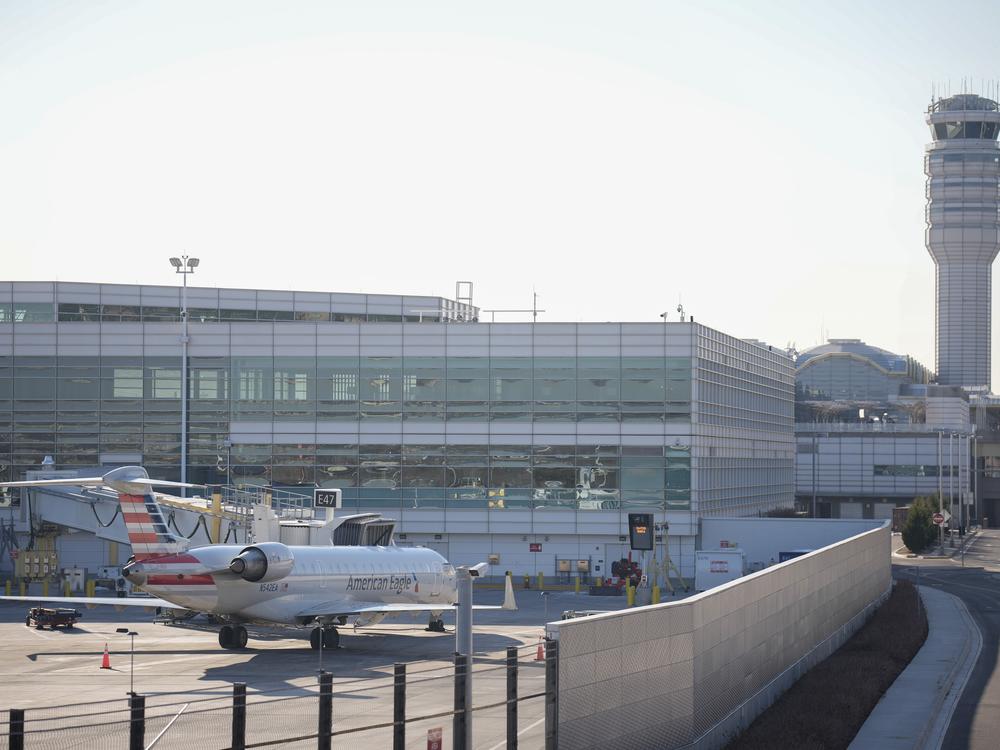 A plane is parked at the Reagan National Airport as the investigation continues into the crash of an American Airlines plane on Jan. 30, 2025 in Arlington, Va.