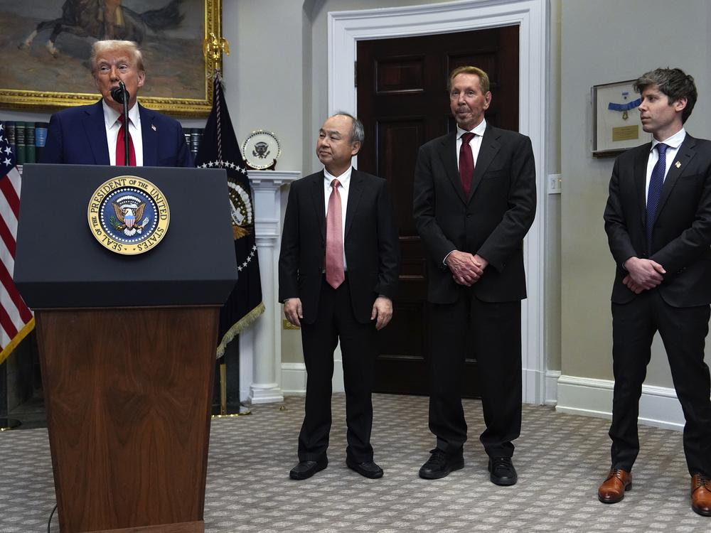 President Donald Trump, from left, speaks as Masayoshi Son, SoftBank Group CEO, Larry Ellison, chairman of Oracle Corporation and chief technology officer, and Sam Altman, OpenAI CEO listen in the Roosevelt Room at the White House, Tuesday, Jan. 21, 2025, in Washington.