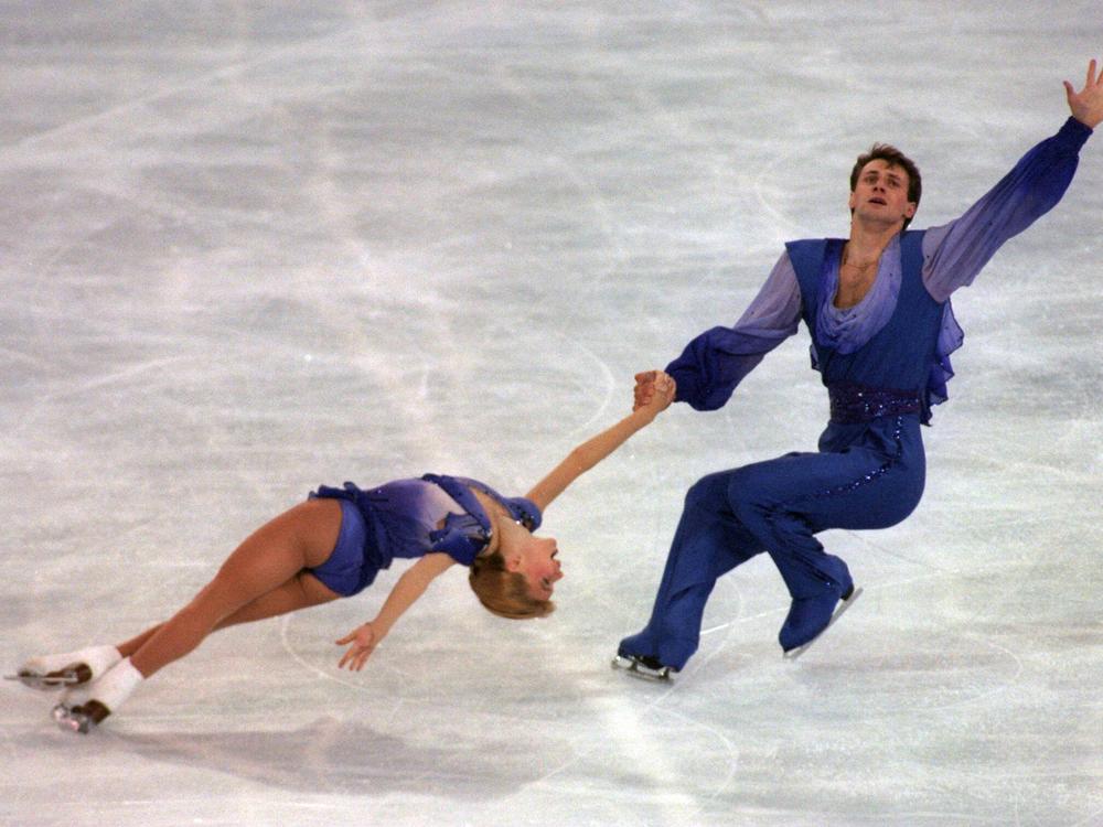 Evgenia Shishkova and Vadim Naumov, pictured at the 1995 World Figure Skating Championships in England. They had since worked as coaches at a training club in Boston. Russian authorities confirmed they were on board the American Eagle flight that crashed after a collision near Washington, D.C.
