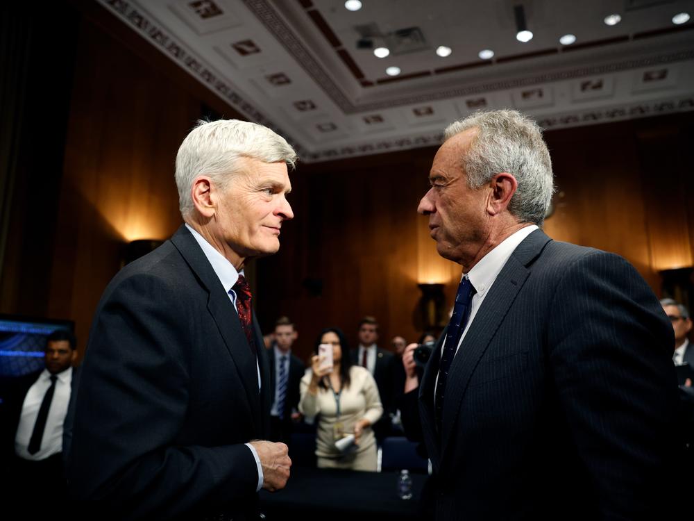 Robert F. Kennedy Jr. shakes hands with Sen. Bill Cassidy, R-La., after the Senate HELP Committee hearing. Cassidy, a doctor, said two children recently died in Louisiana of vaccine-preventable diseases.