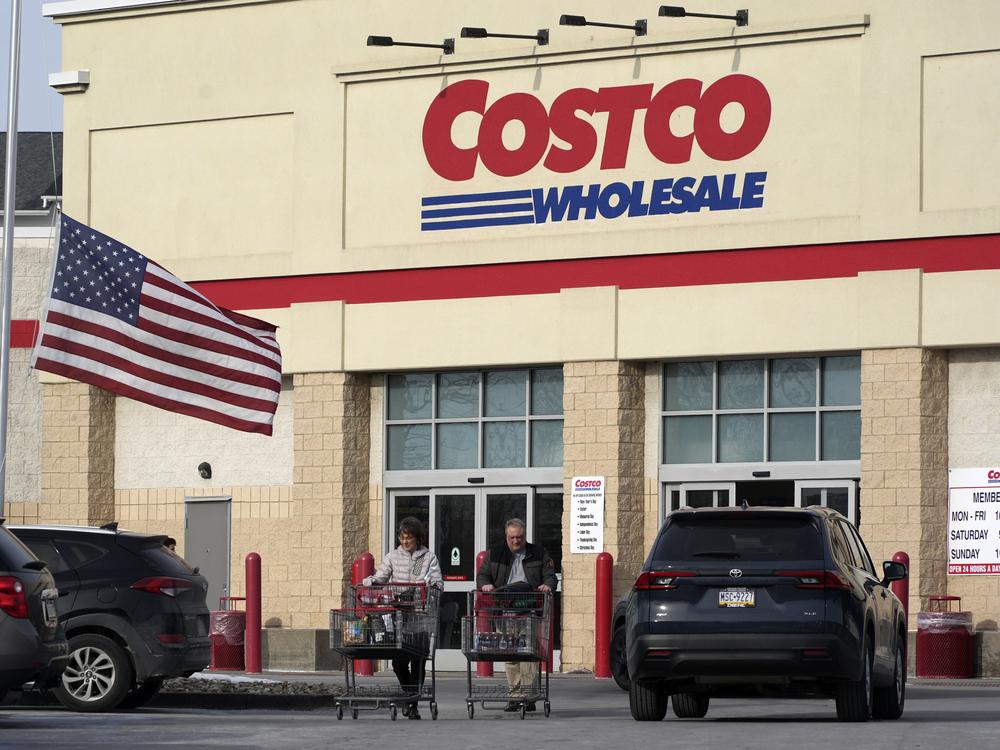Shoppers exit a Costco warehouse in Cranberry, Pa., on Jan. 28.