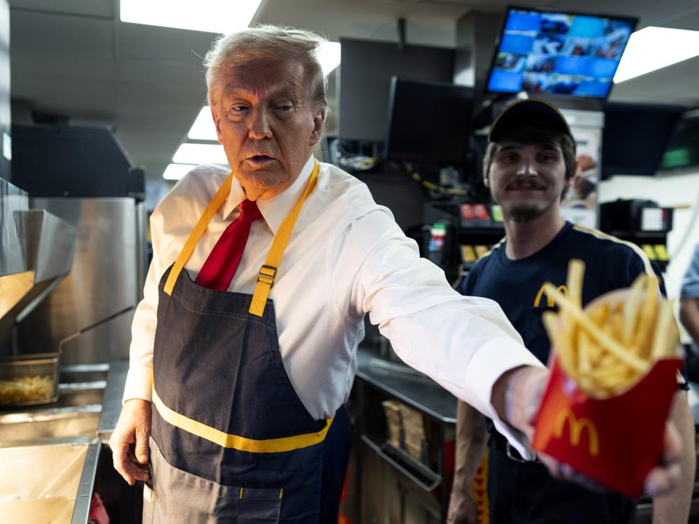 Donald Trump works behind the counter during a campaign event at McDonald's restaurant on Oct. 20, 2024 in Feasterville-Trevose, Pa.