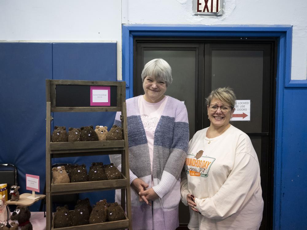 Mindy Grose (left) and Tracy McCoy selling groundhog-related crafts at the Punxsutawney Community Center.
