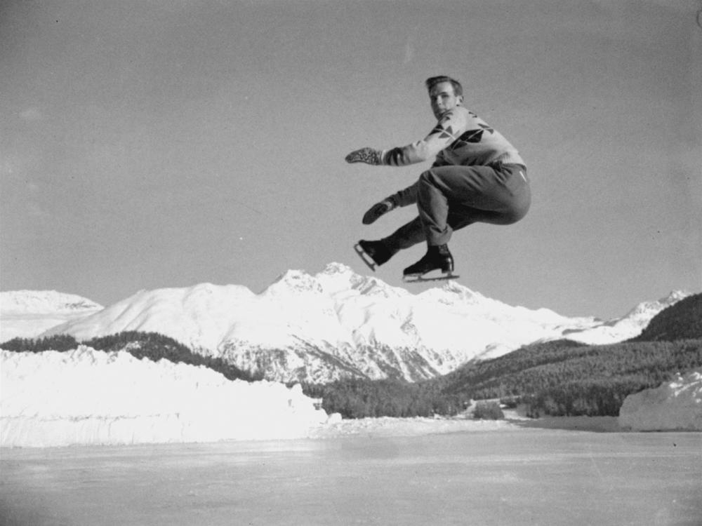 Dick Button of Englewood, N.J., U.S. and North American men's figure skating champion, and winner of the European title, executes a jump during a practice session at St. Moritz, Switzerland, on Jan. 19, 1948, in preparation for the Winter Olympics of 1948.