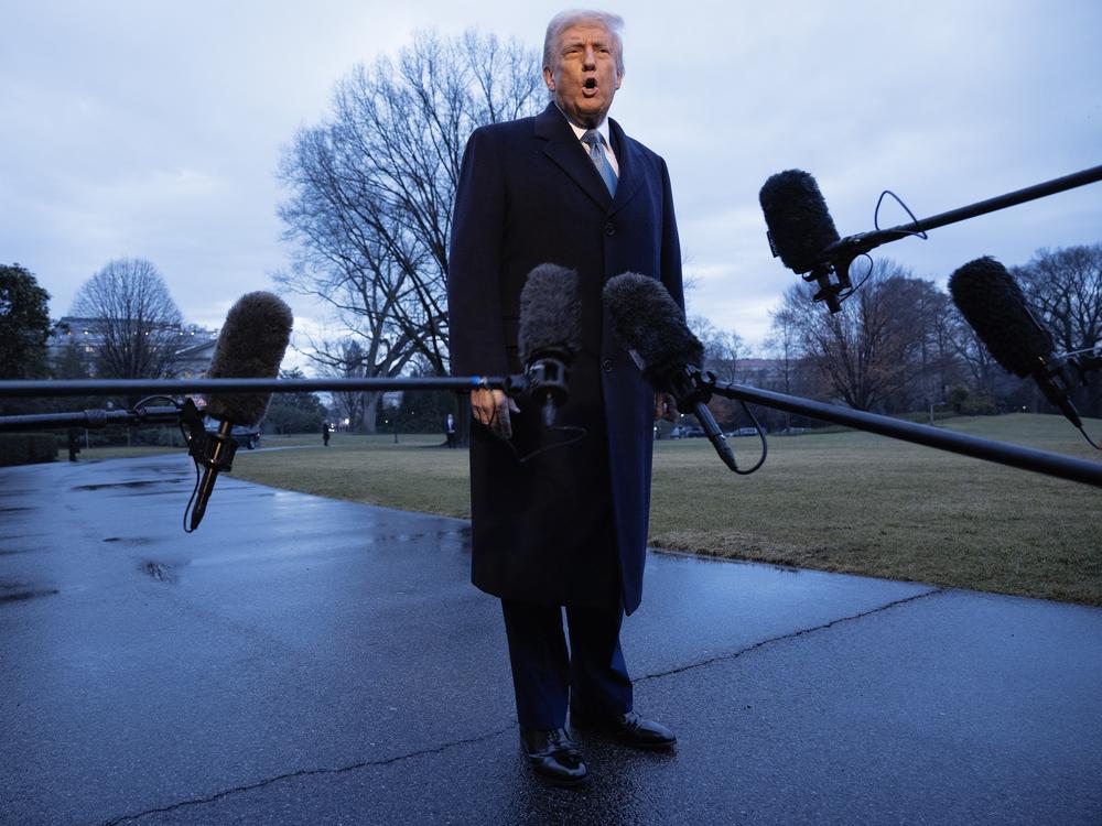 President Trump speaks briefly to the press as he departs the White House on Friday for his Mar-a-Lago Club in Palm Beach, Fla.