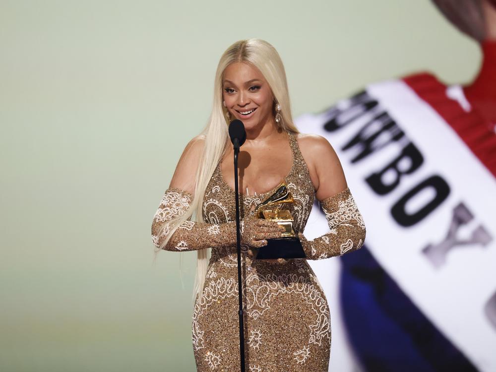 Beyoncé onstage Sunday night at the 67th Grammy Awards in Los Angeles, where her album <em>Cowboy Carter</em> received historic wins for best country album and album of the year.