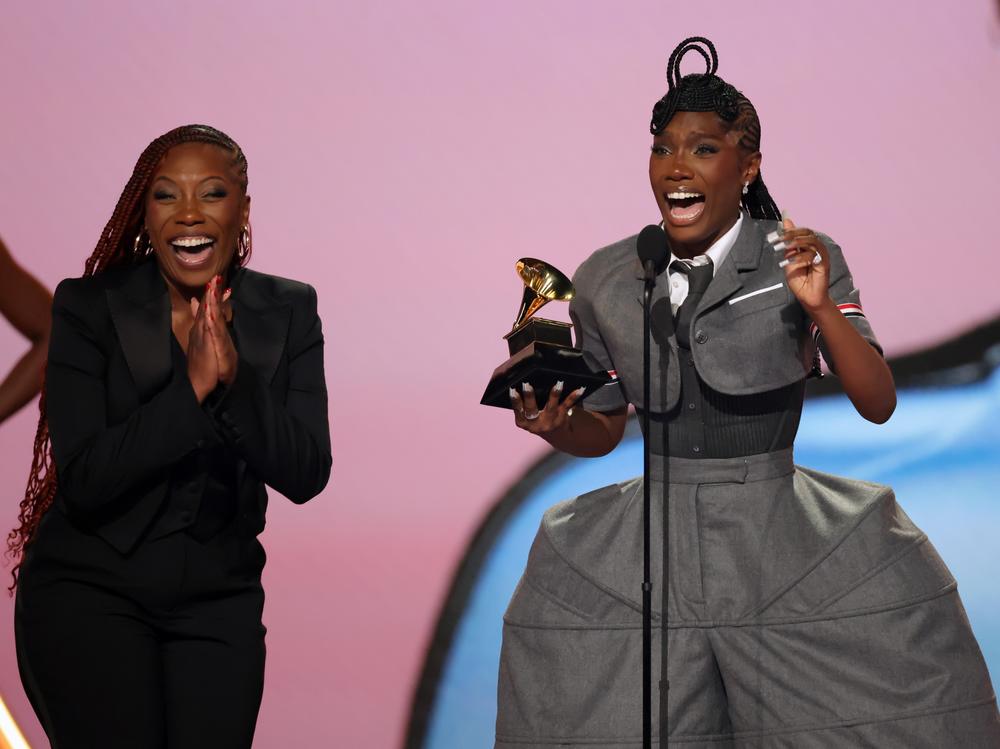 Doechii (at right) accepts the Grammy for best rap album alongside her mother, Celesia Moore. Just after the ceremony, she released a new song called 