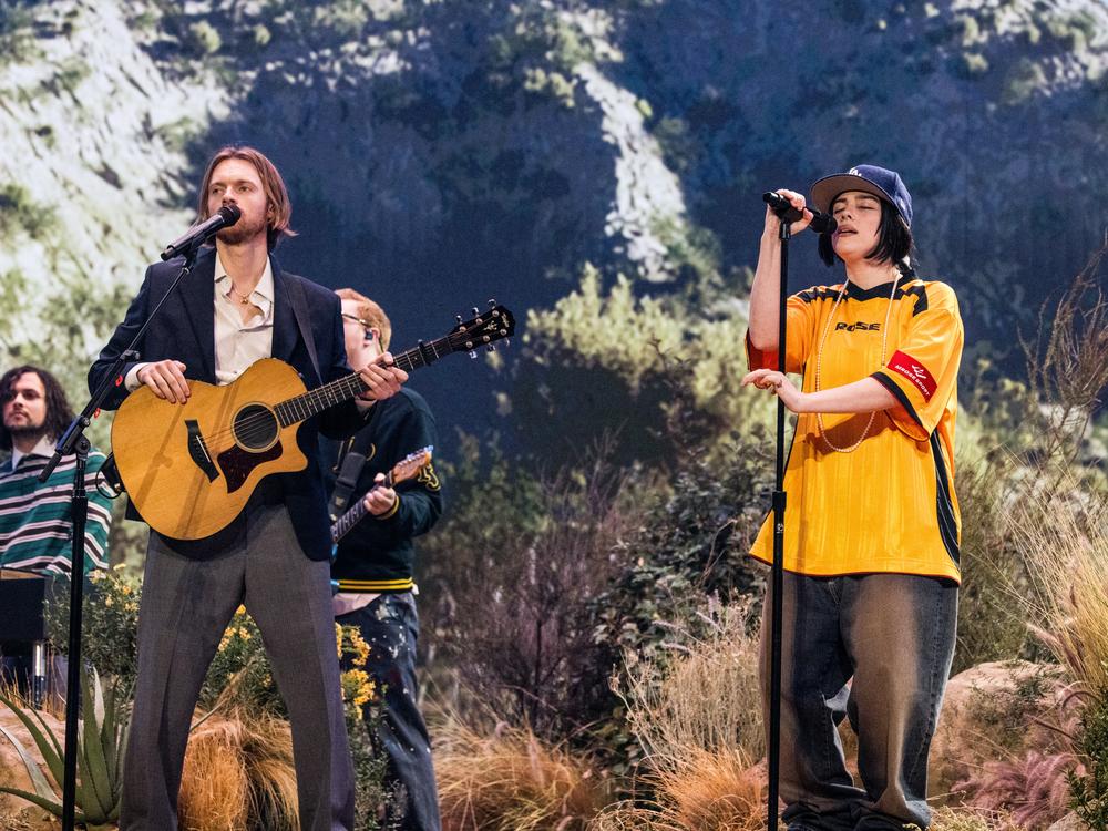 Finneas and Billie Eilish perform onstage during the 67th Annual GRAMMY Awards.