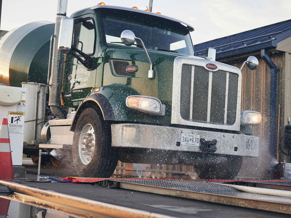 Trucks are washed before entering Herbruck's Poultry Ranch, one of the biosecurity measures farms have taken to try to reduce the spread of bird flu.<br>