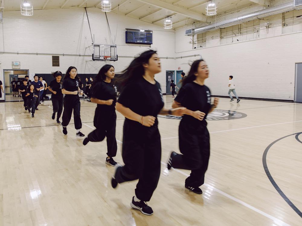 Routine warm-up exercises at the headquarters in August 2024.